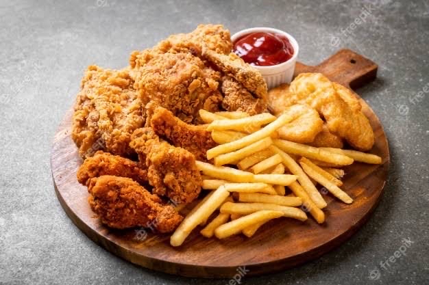 Chips and eggs with chicken