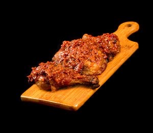 Roasted chicken pieces pepper sauce